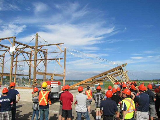 Harris Barn being reassembled in it's current location on Arthur Drive - 2012