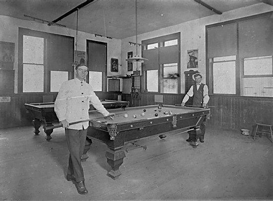 Billy Maxwell and Walter Creech playing pool in McCrea's Pool Hall - circa 1919